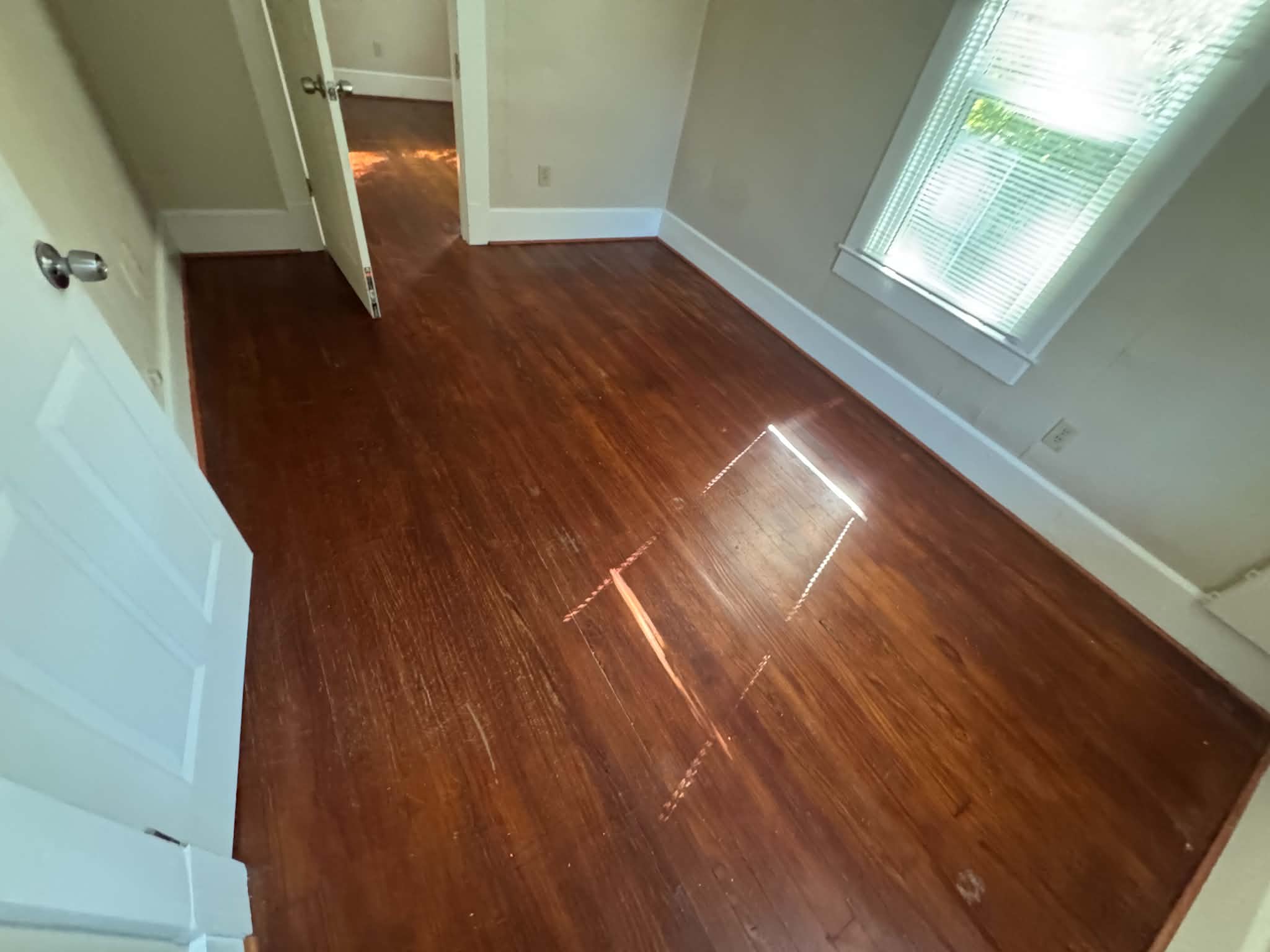 Bedroom with refinished floors