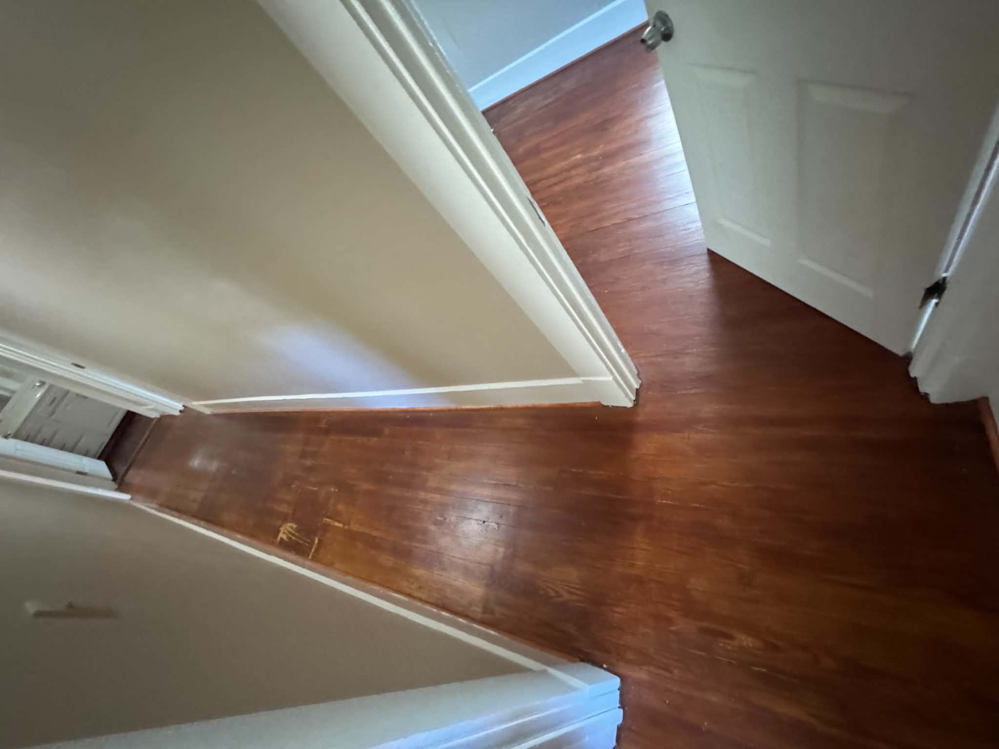 Hallway with hardwood floors