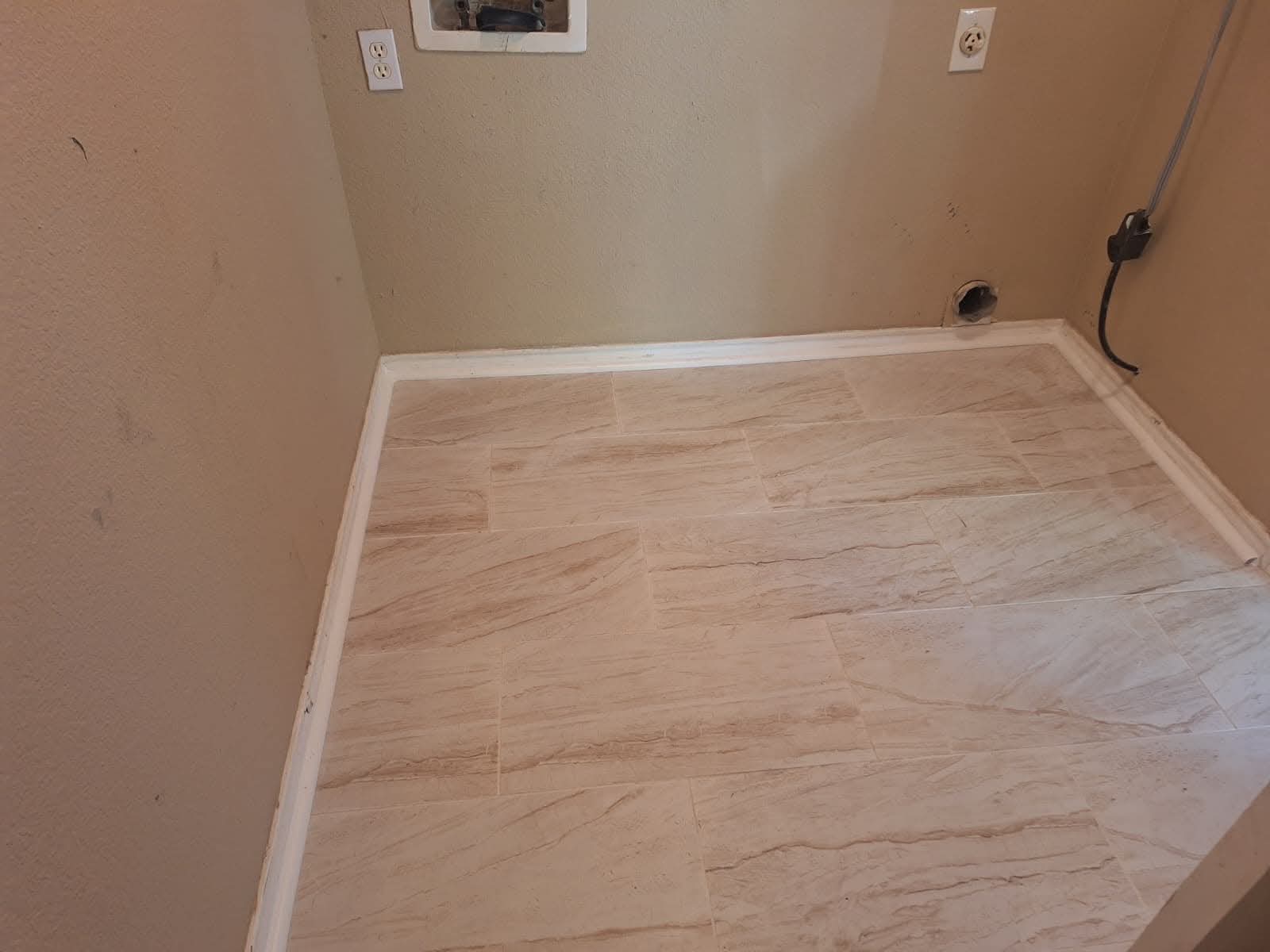Tile flooring in laundry room