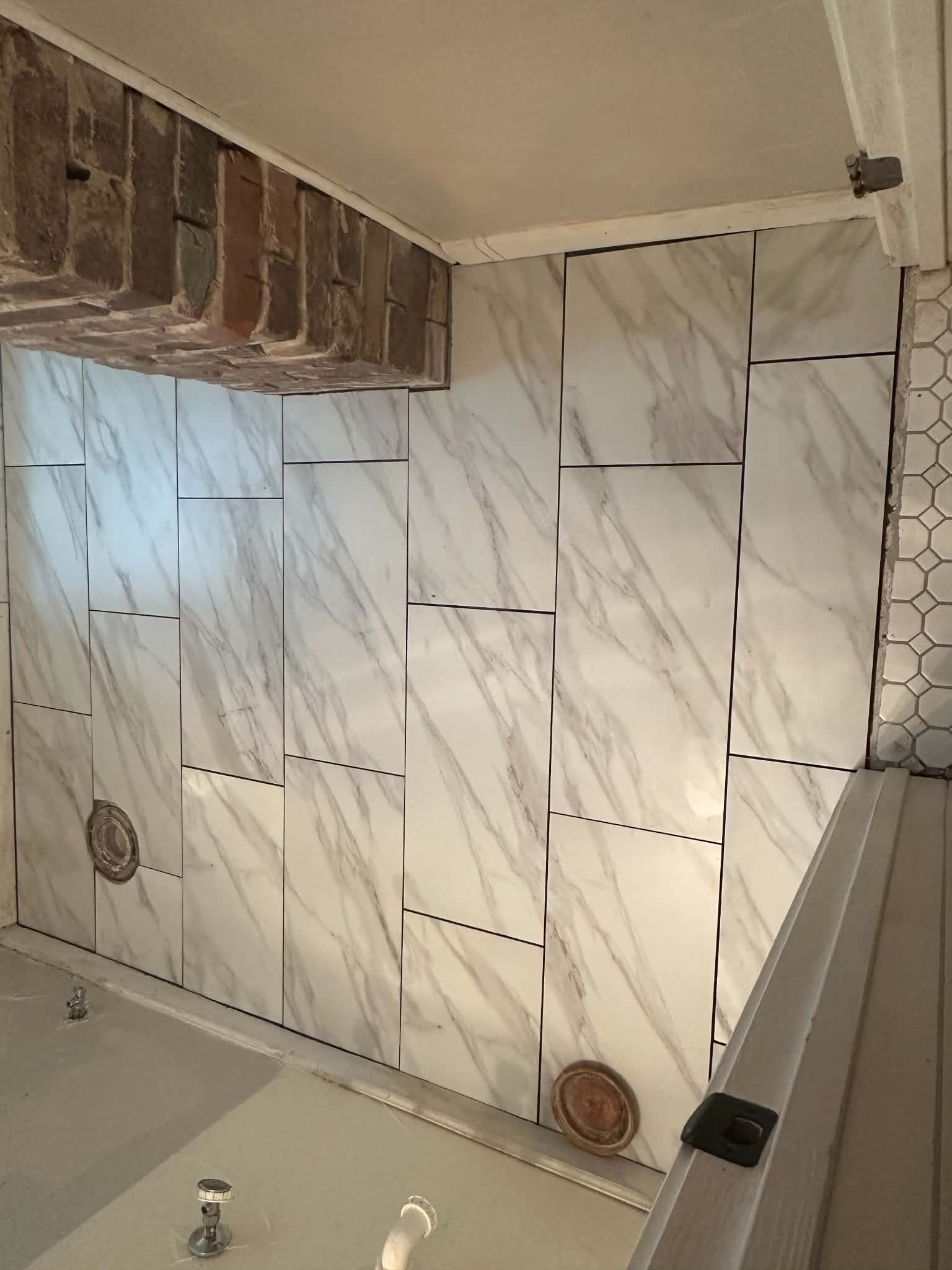 Marble tile shower wall installation