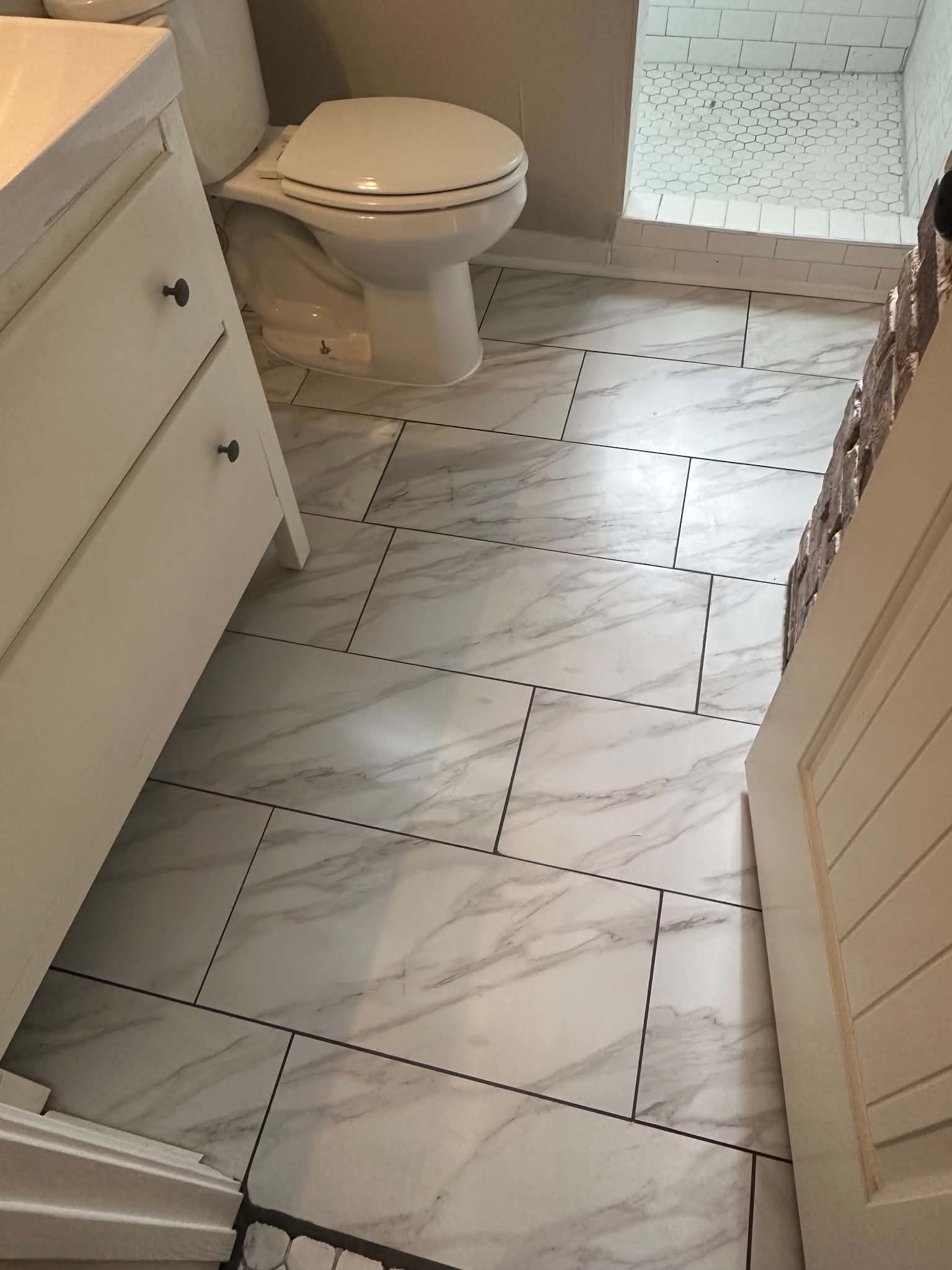 Bathroom with marble tile floor