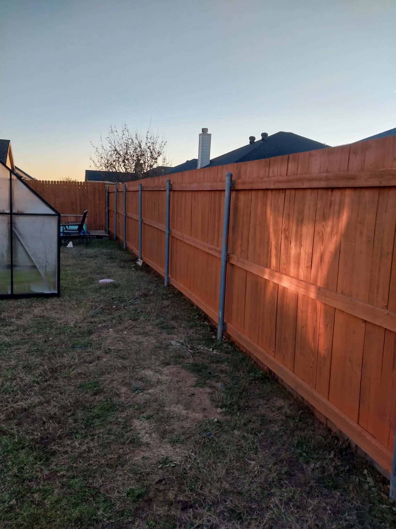 Cedar fence with metal posts