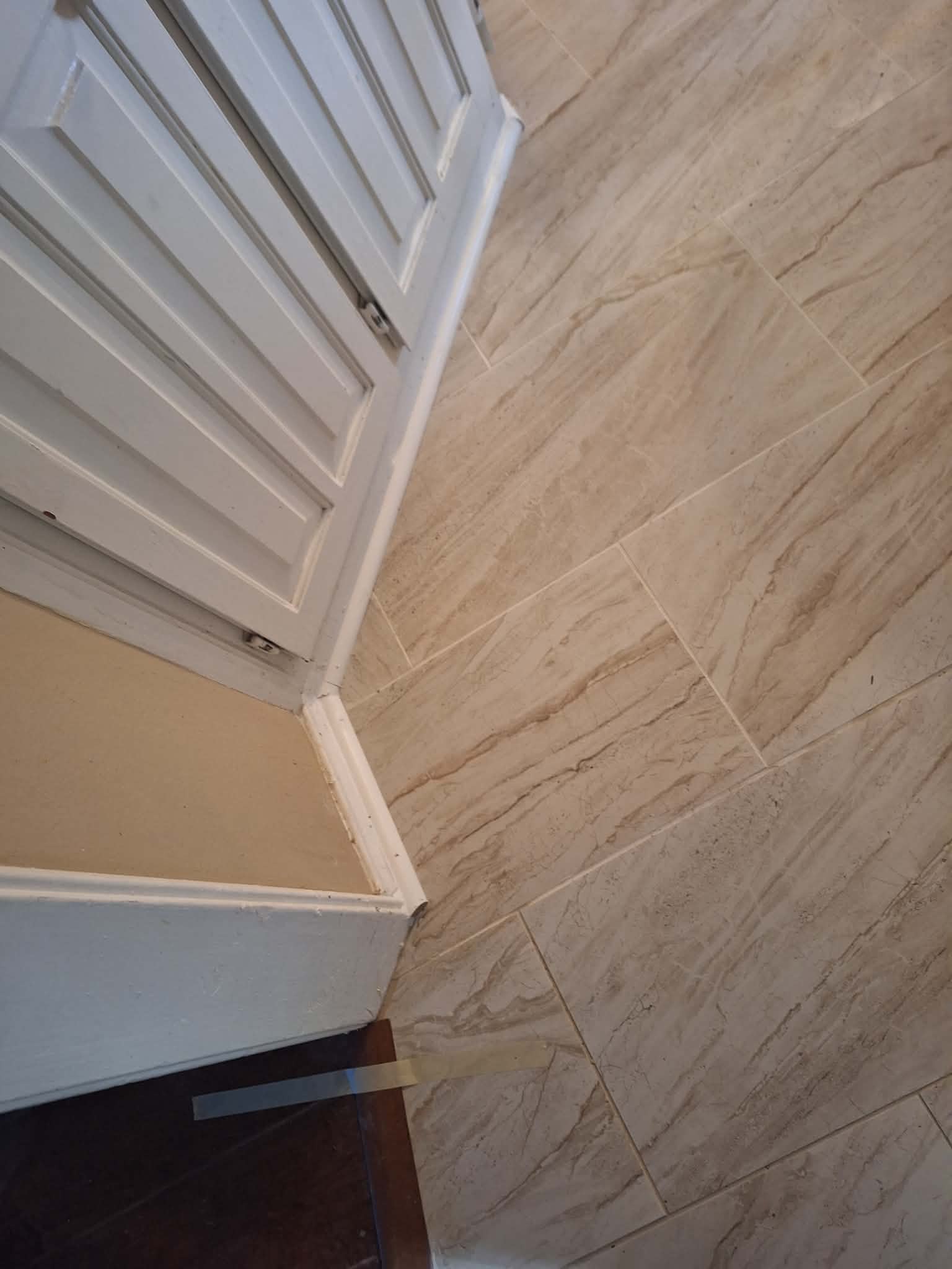 Tile flooring near closet door