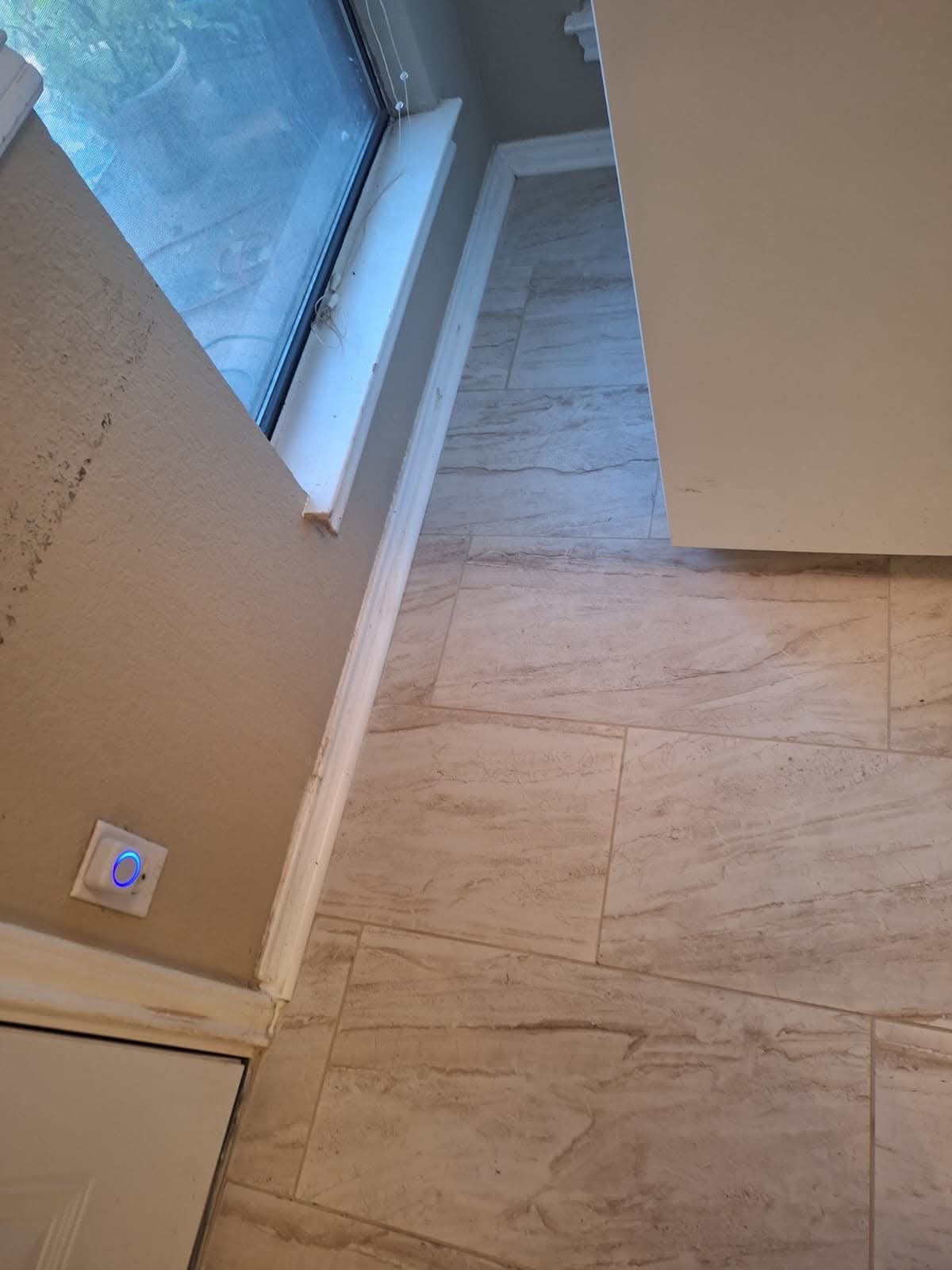 Tile flooring with sliding door