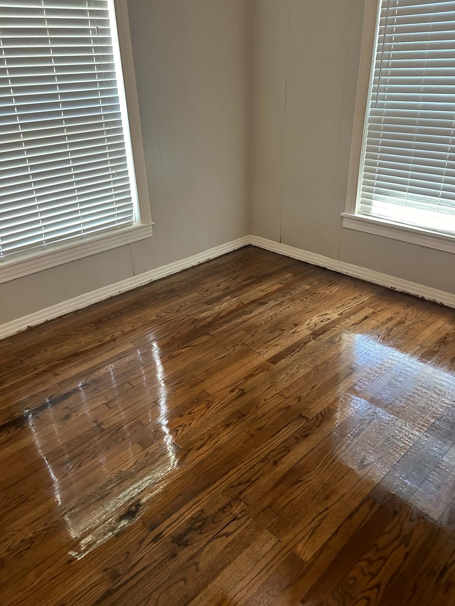 Refinished hardwood floors corner room