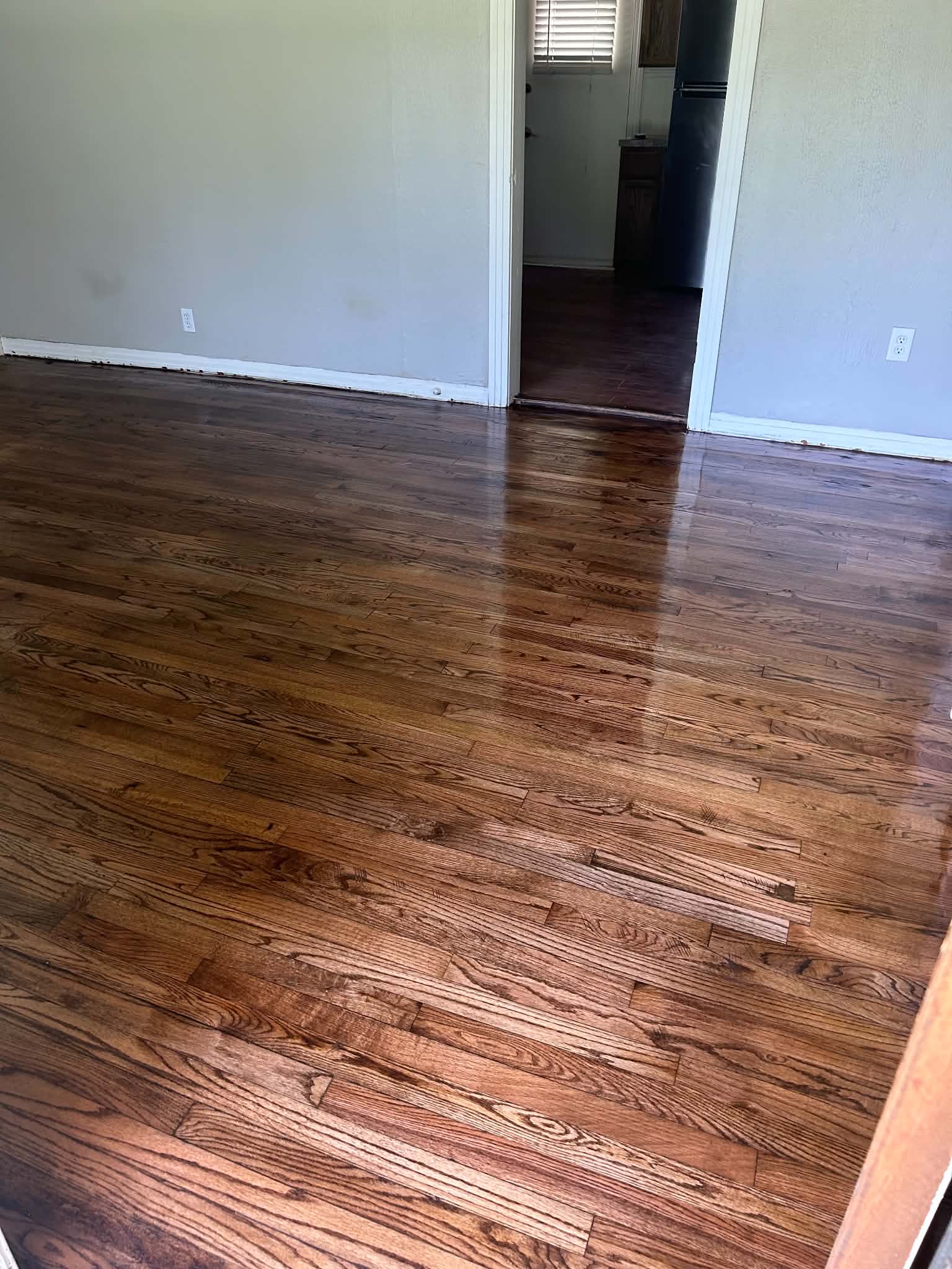 Refinished hardwood floors in hallway