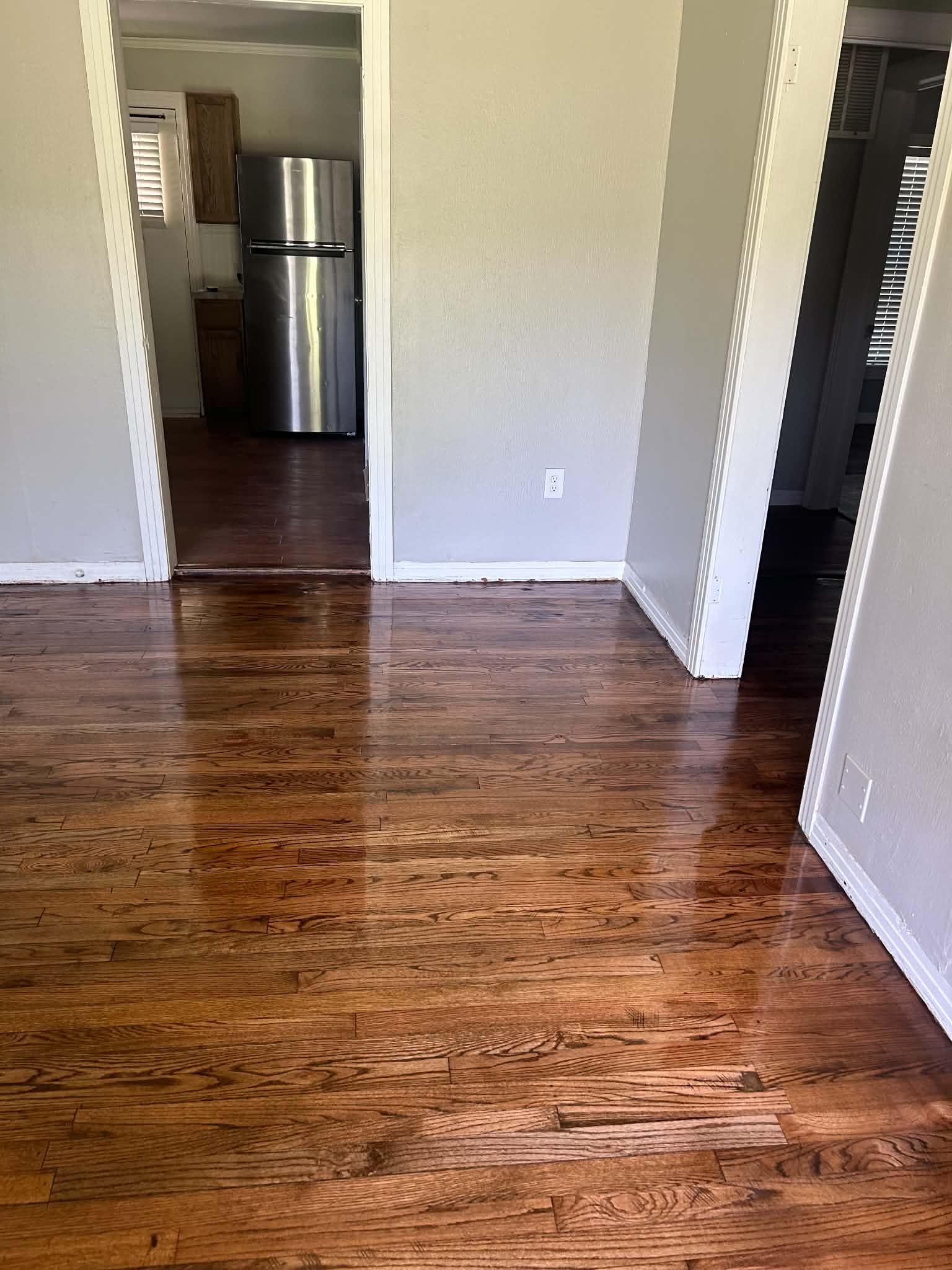 Refinished hardwood floors in living area